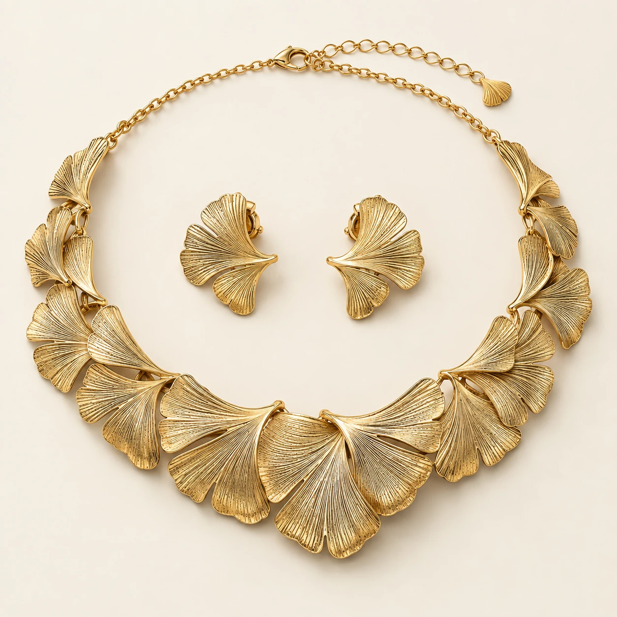 Aangan Leaf Collar Set — one leaf collar necklace and two matching leaf earrings