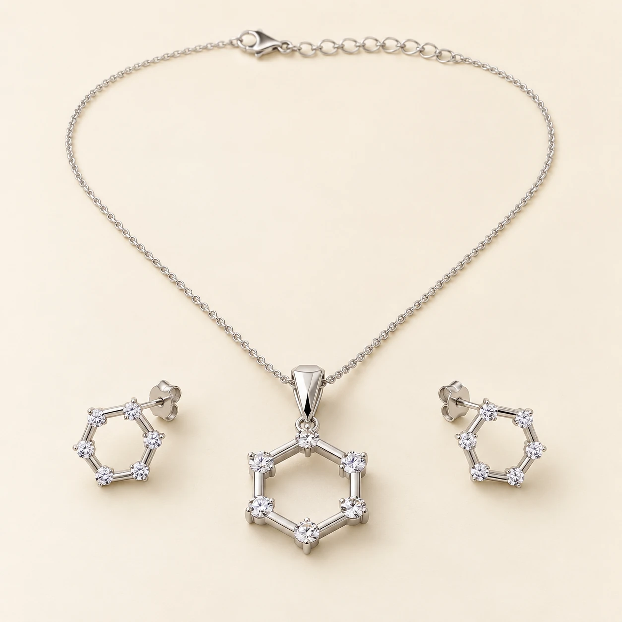 Ayna Diamond Pendant Set — one diamond-style pendant on chain and two matching hexagon studs