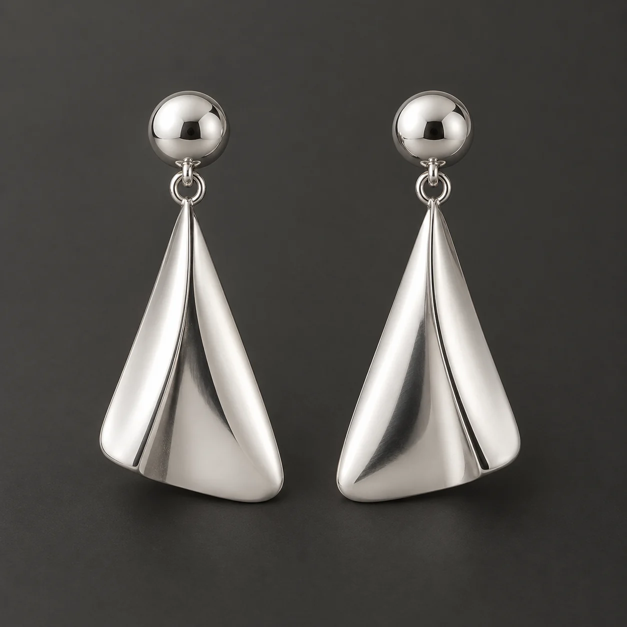 Aaina Silver Fold Earrings - One matched pair of folded silver earrings.