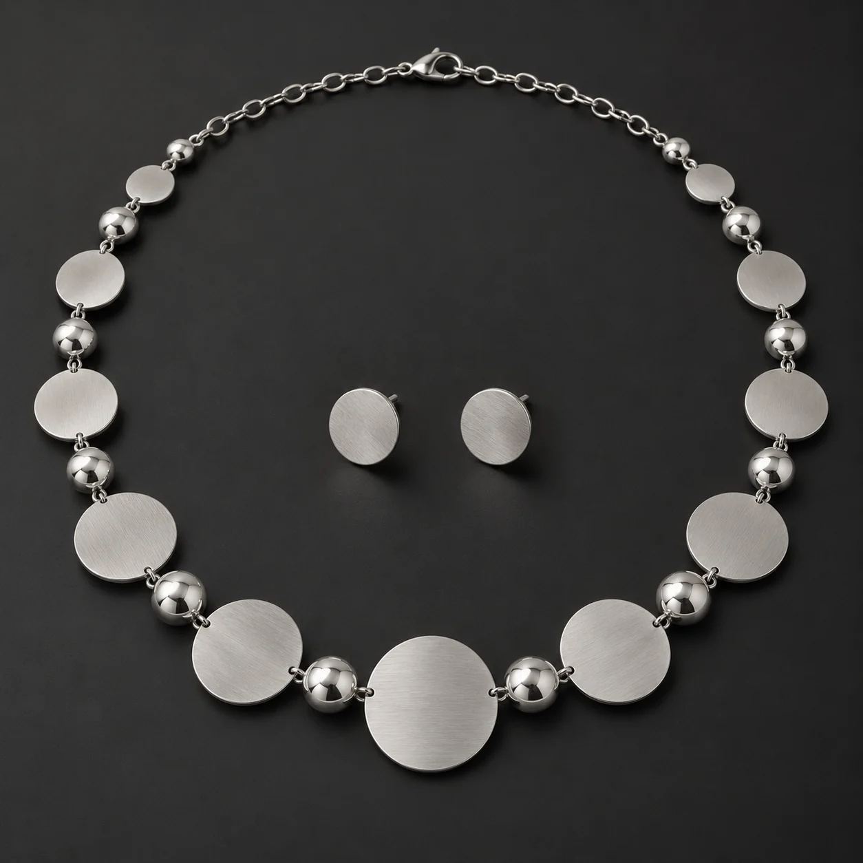 Chand Silver Disc Necklace Set - One silver disc necklace and two matching studs.